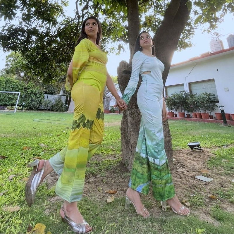 Community members connecting with nature outdoors in a green landscape