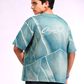 Close-up of Cracked Ice Tee showing fractured ice-inspired print details