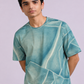 Cracked Ice Tee featuring abstract cracks and formations inspired by polar ice