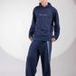 Distance → Illusion Hoodie showing layered reconstructed blue denim panels