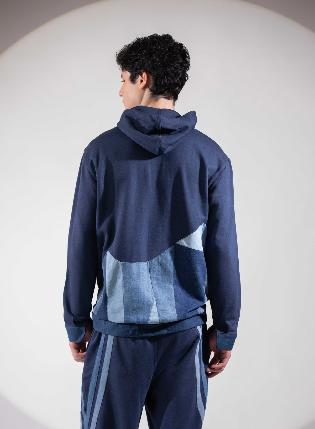 Close-up of Distance → Illusion Hoodie showing polar mountains, glaciers and fractured ice