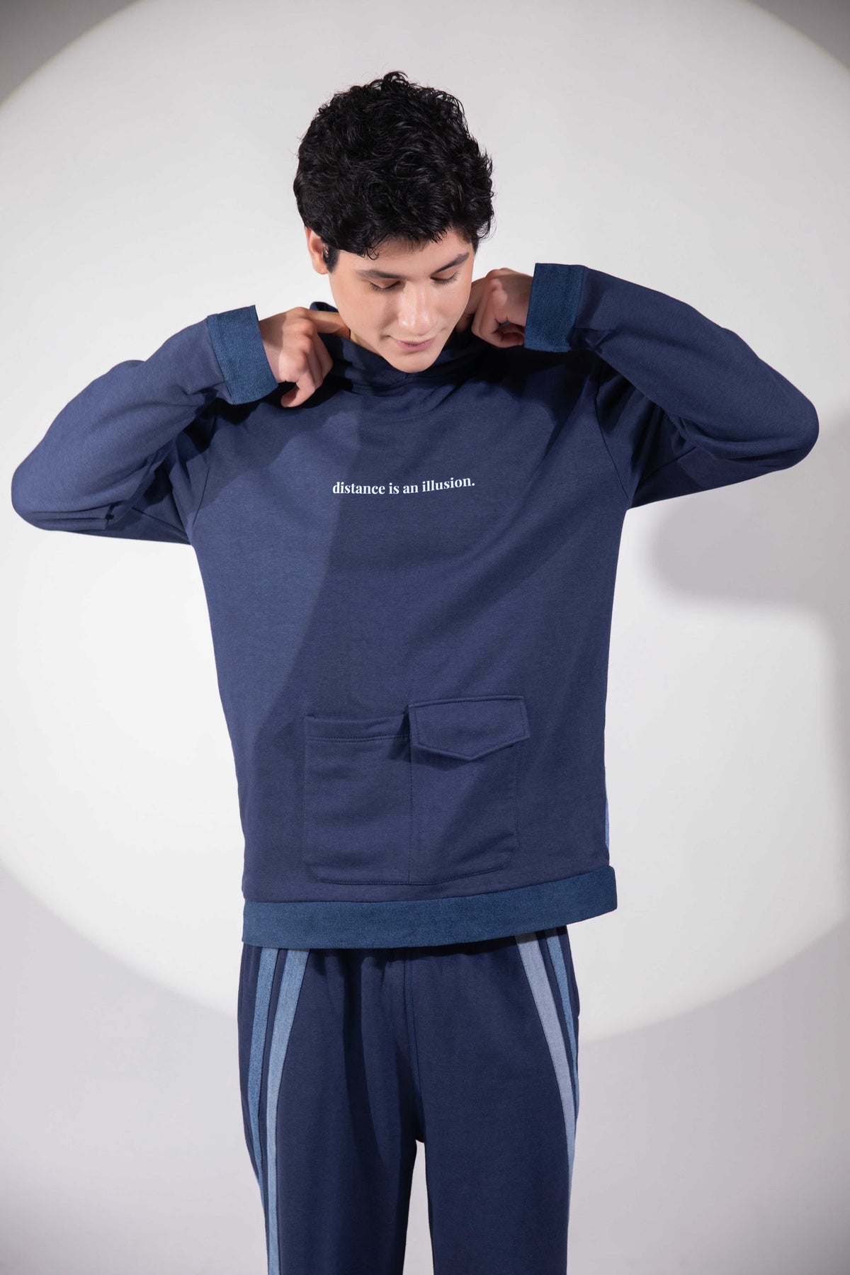 Distance → Illusion Hoodie in reconstructed denim styled as contemporary polar-inspired menswear