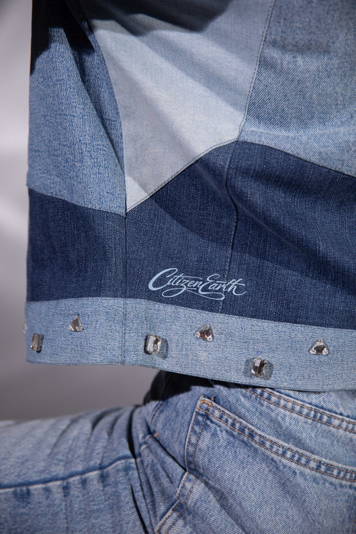 Close-up of Drift Weave Denim Jacket showing glass bead detailing