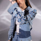 Close-up of Drift Weave Denim Jacket showing three-tone triangular denim panels