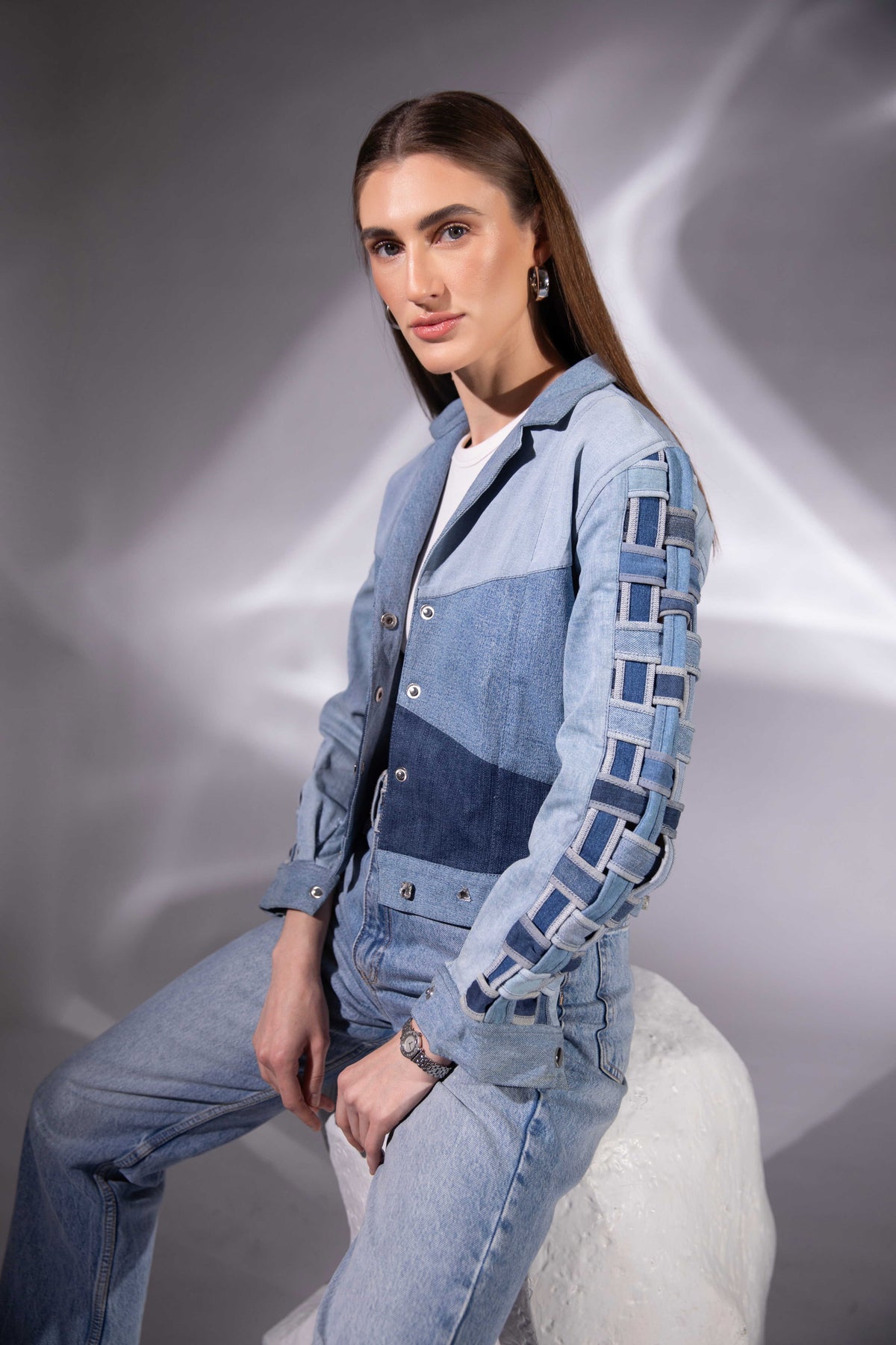 Side view of Drift Weave Denim Jacket showing its layered denim construction
