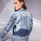 Back view of Drift Weave Denim Jacket showing woven denim sleeves and panel construction