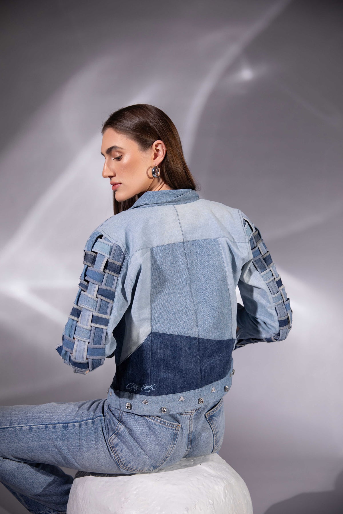 Drift Weave Denim Jacket showing woven denim sleeves in multiple blue tones