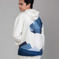 Close-up of Endurance Hoodie showing reconstructed denim polar landscape patchwork