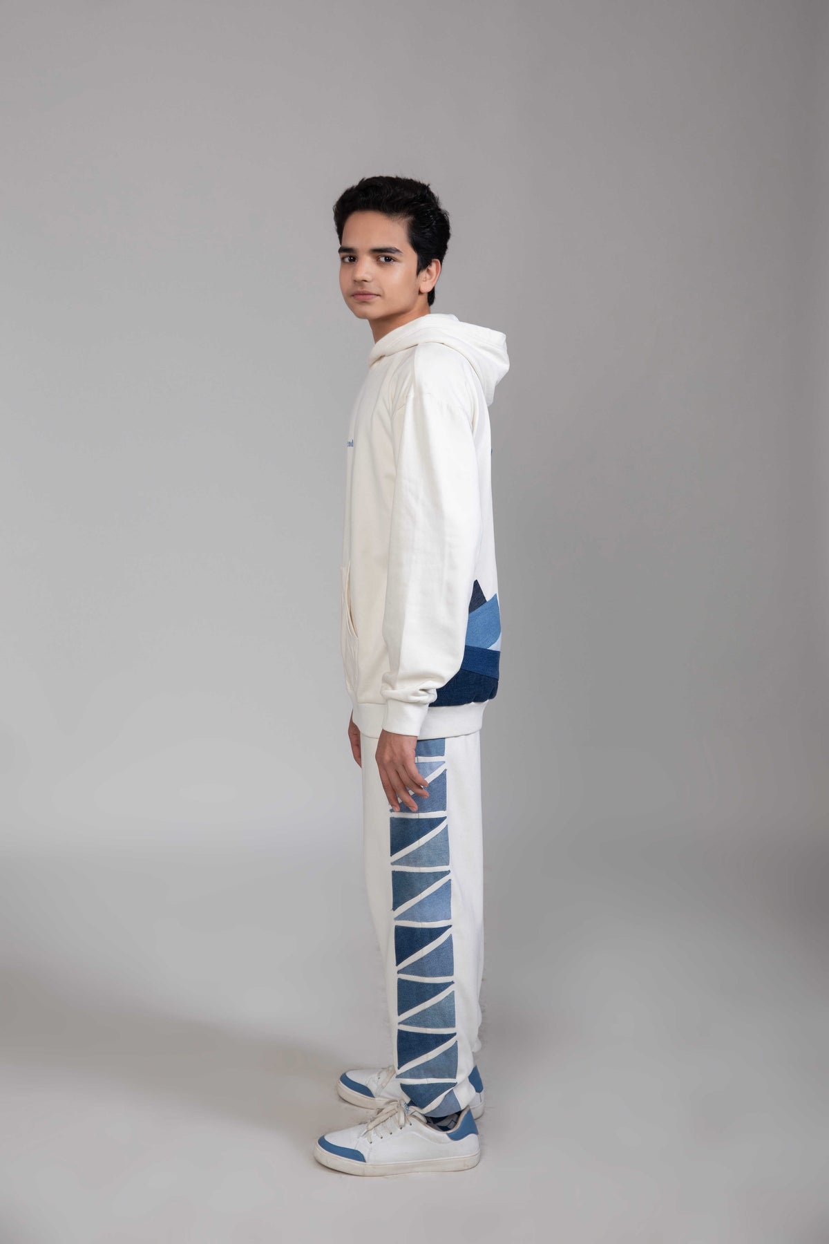 Side view of Endurance Hoodie showing its contemporary oversized silhouette