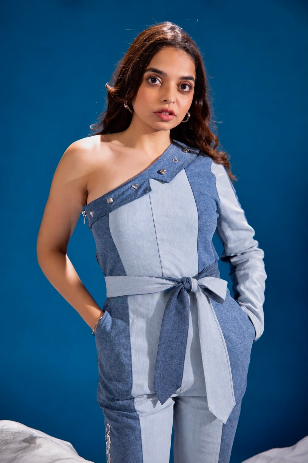 Fearless Ferð Denim Jumpsuit in repurposed denim with one-shoulder silhouette
