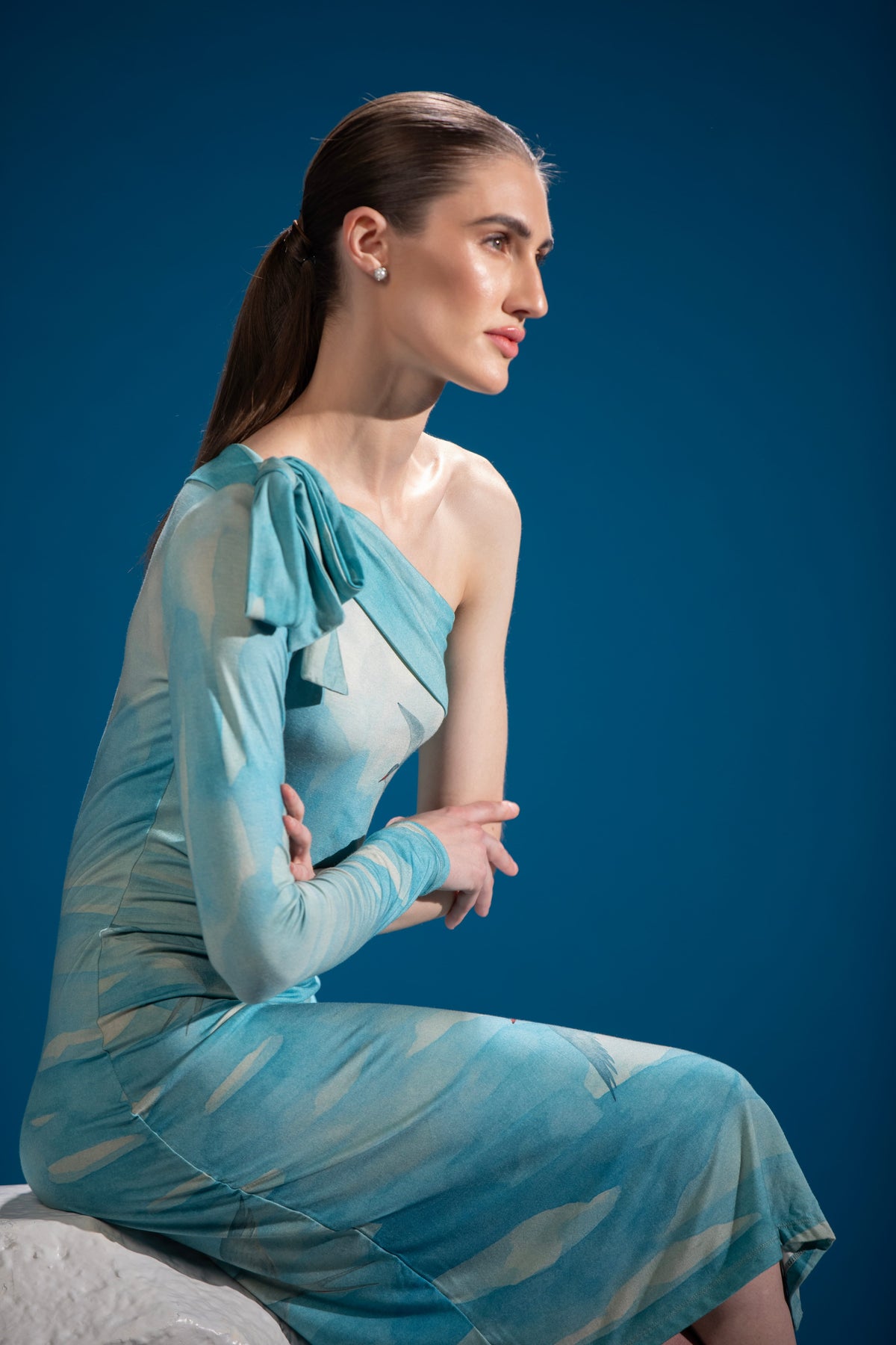 Close-up of Ferð in Flight Dress showing its adjustable shoulder tie