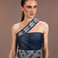 Flowform Denim Top in repurposed denim with an asymmetric silhouette