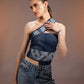 Close-up of Flowform Denim Top showing interlocking spiral denim panels