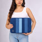 Fram Strait Laptop Sleeve showing parallel pintucks in deep indigo and glacial blue denim