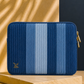 Close-up of Fram Strait Laptop Sleeve showing textured denim pintuck construction