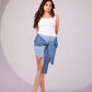 Frosted Bloom Mini Skirt showing ice-blue denim and contrasting tie-up detail