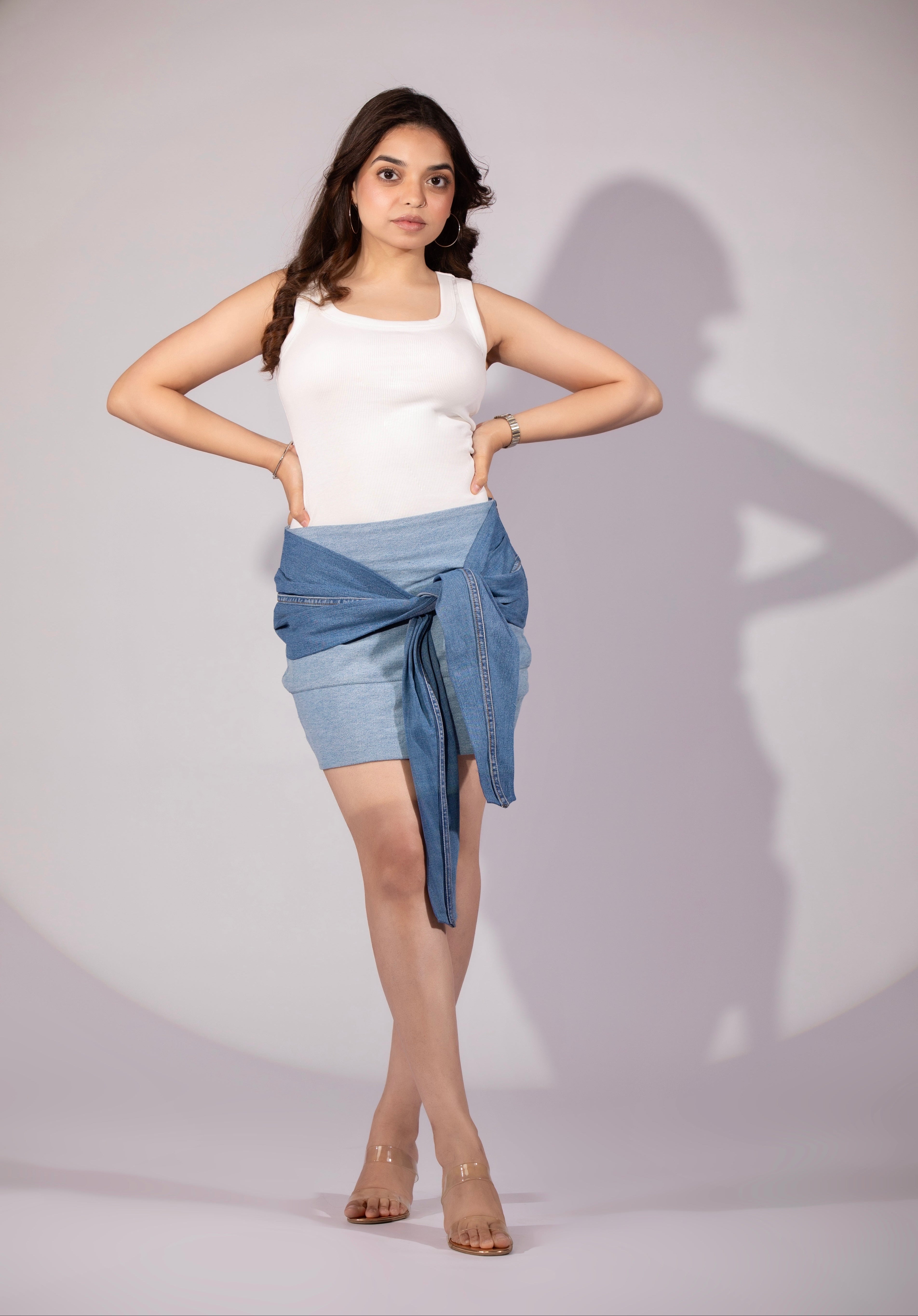 Frosted Bloom Mini Skirt in ice-blue repurposed denim with panel construction