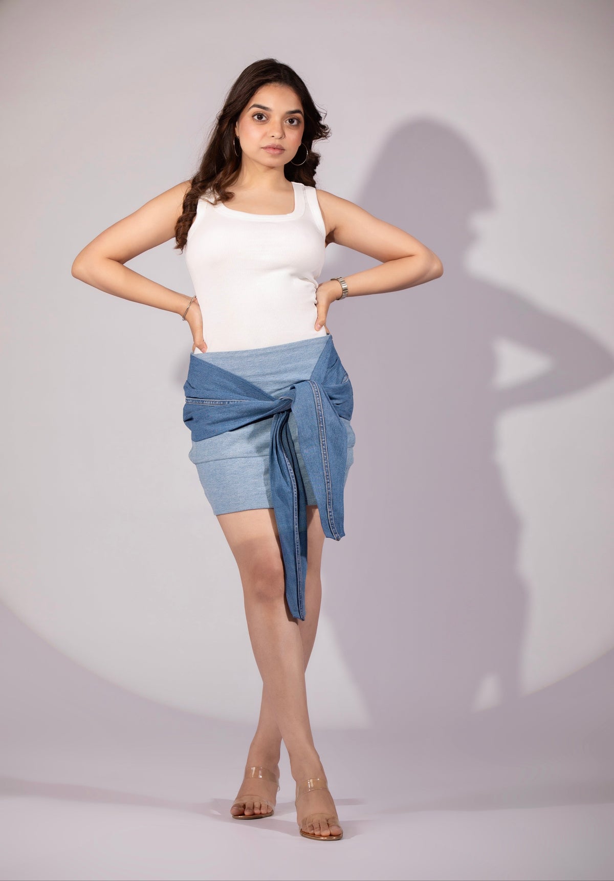 Frosted Bloom Mini Skirt in ice-blue repurposed denim with panel construction