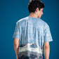 Close-up of Frozen Landscape Tee showing layered glacial landscape artwork