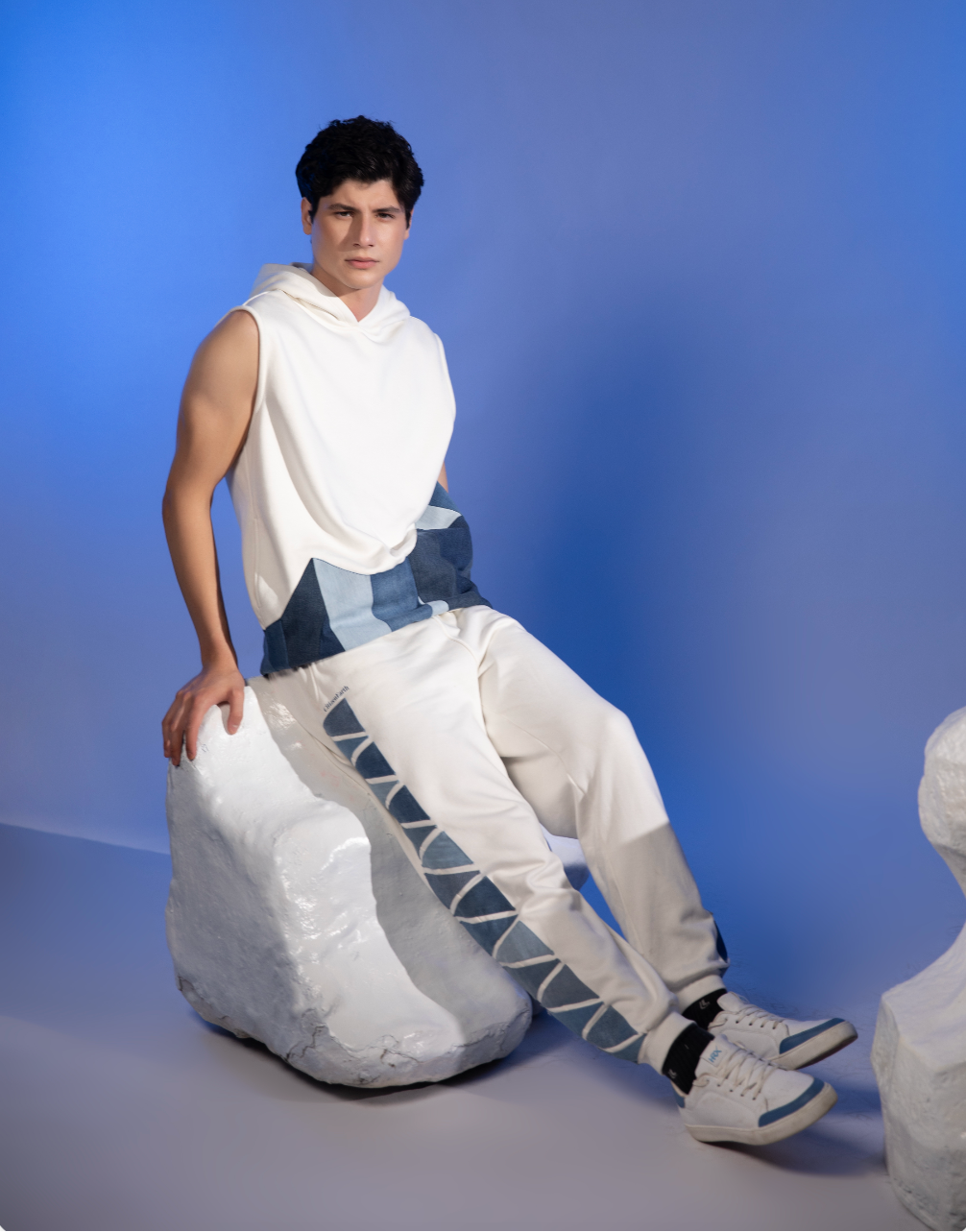 Close-up of Glacial Geometry Jogger showing layered blue denim patchwork