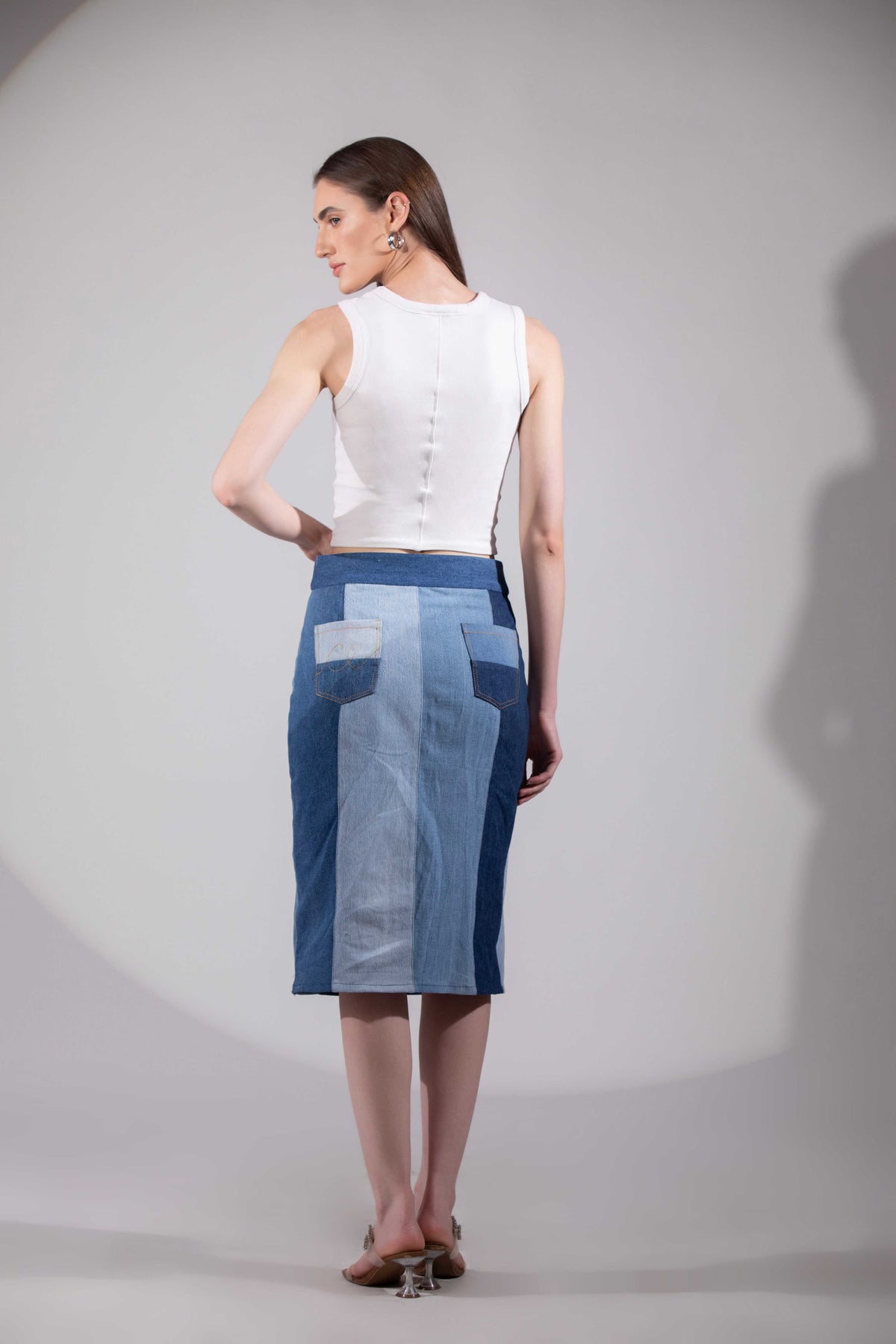 Back view of Glacial Symmetry Skirt in repurposed denim