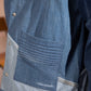 Close-up of Glacier Ridge Denim Jacket showing geometric repurposed denim panels