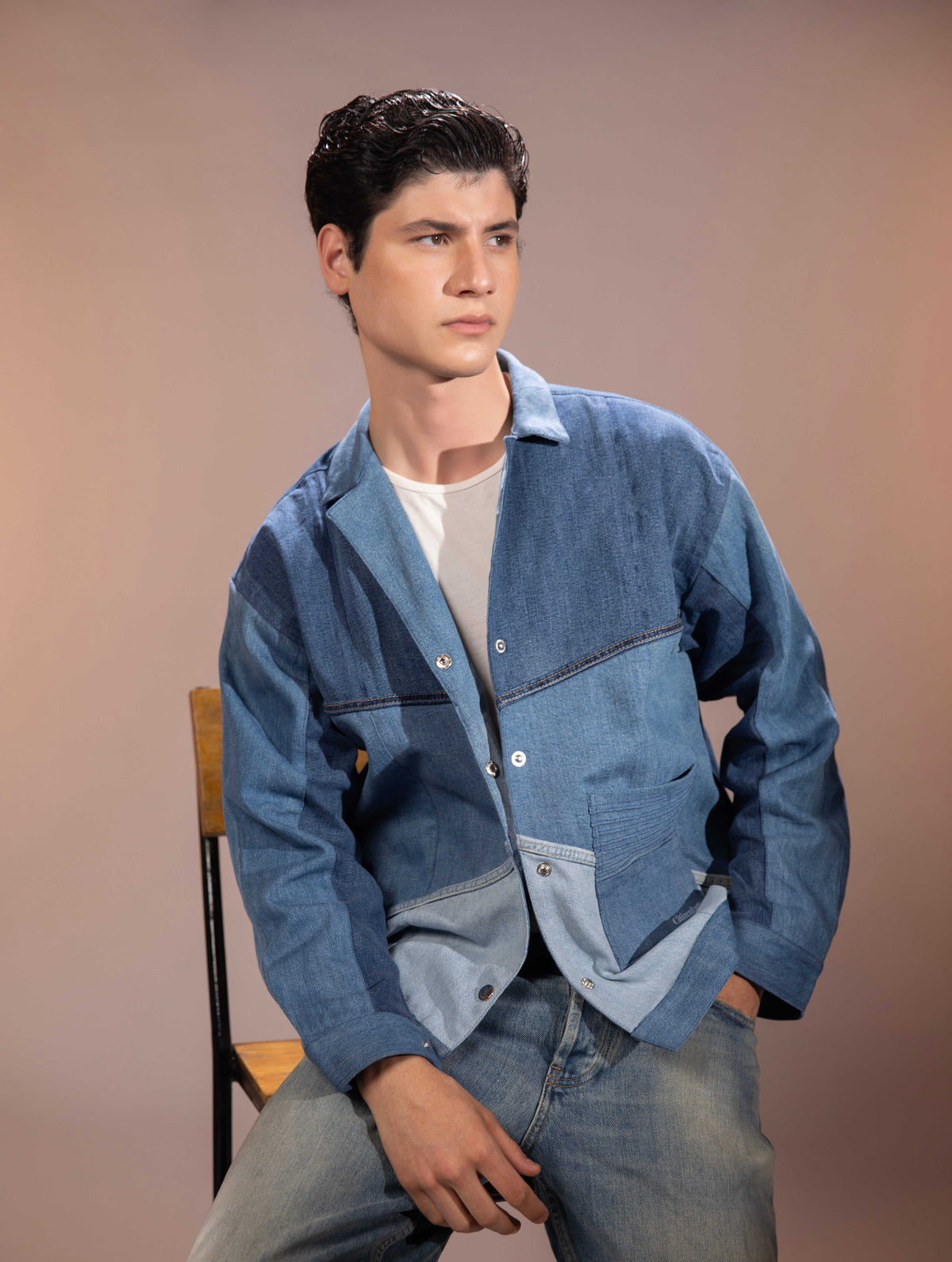Glacier Ridge Denim Jacket featuring geometric mountain-inspired denim patchwork