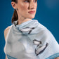 Happy Feet Club Scarf featuring a penguin family on an Antarctic landscape
