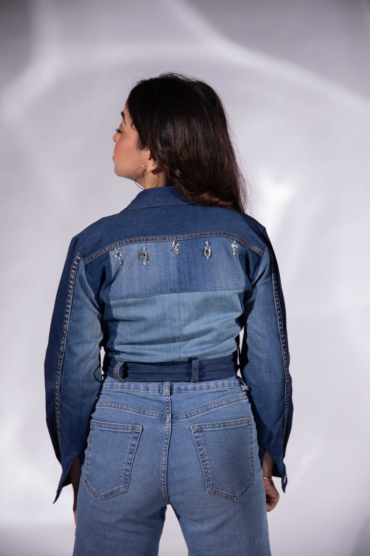 Back view of Ice Curve Denim Jacket in repurposed denim