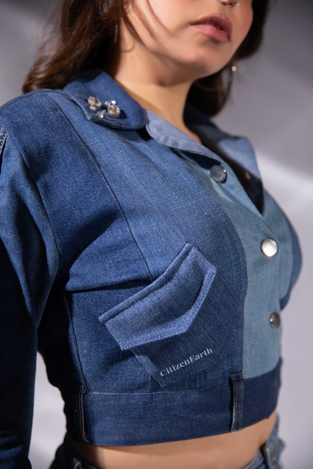 Ice Curve Denim Jacket showing its curved front placket