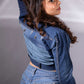 Side view of Ice Curve Denim Jacket showing its cropped silhouette