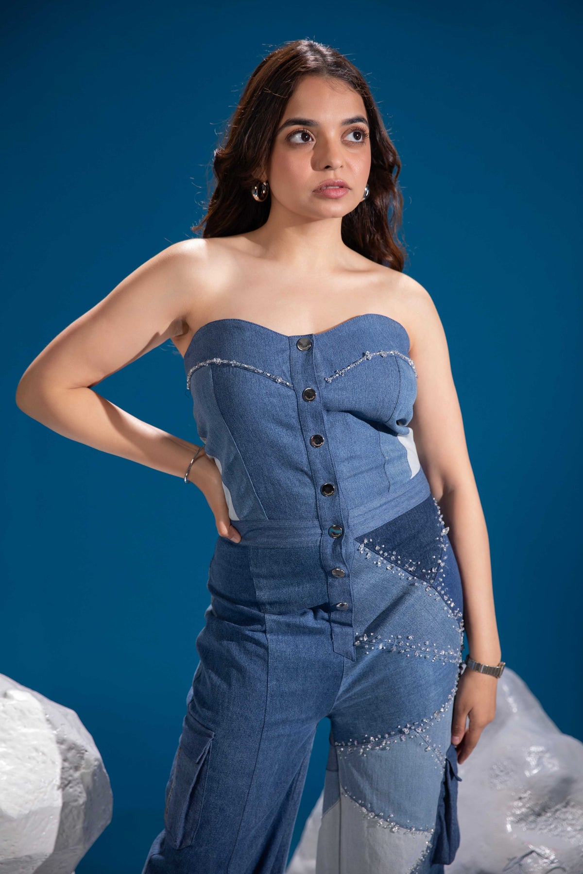 Ice Prism Denim Jumpsuit showing its sculptural repurposed denim construction
