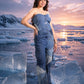 Side view of Ice Prism Denim Jumpsuit showing its sculptural silhouette