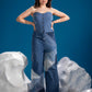 Close-up of Ice Prism Denim Jumpsuit showing triangular denim patchwork