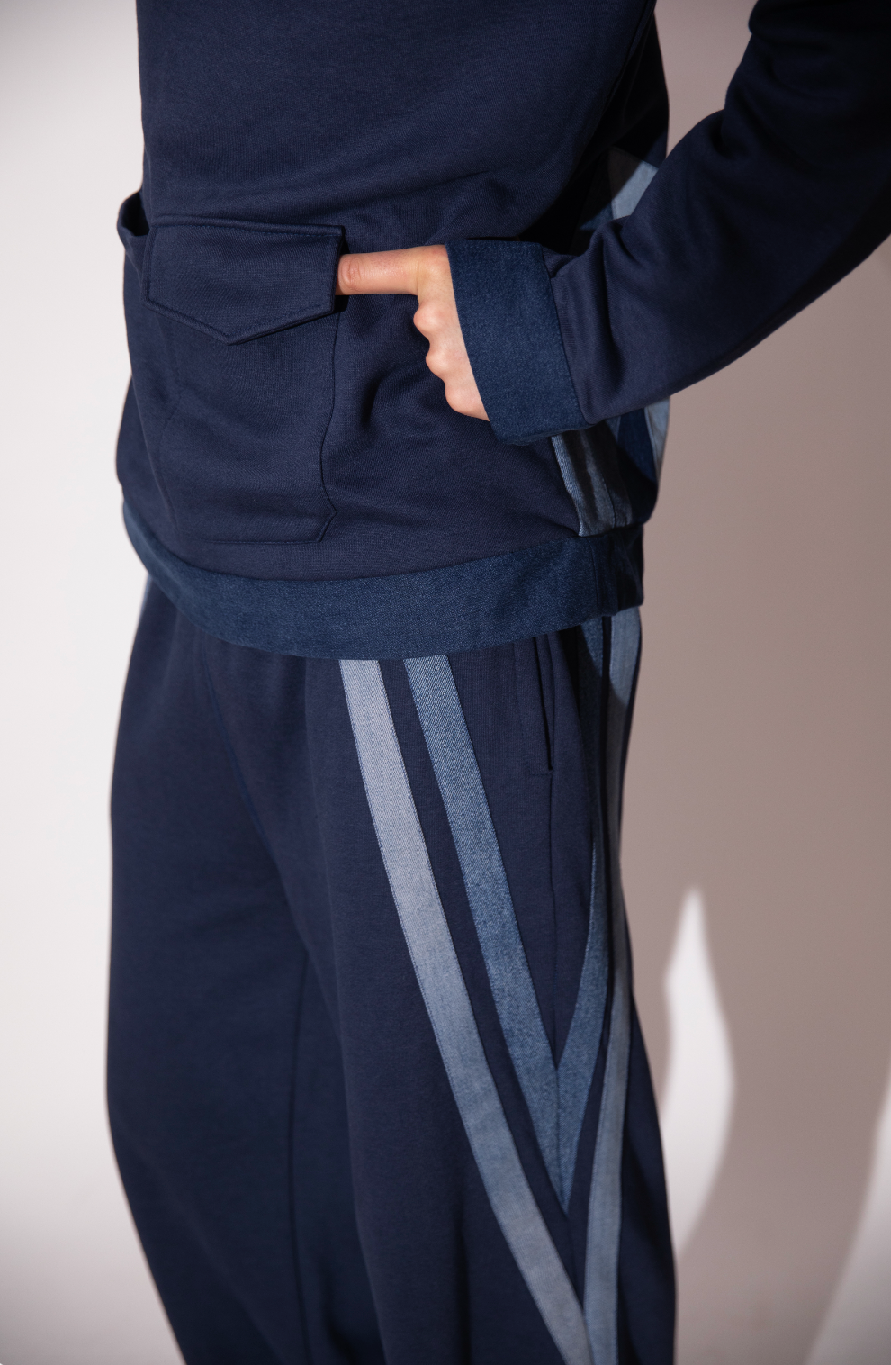Close-up of Ice Trail Jogger showing elongated reconstructed denim strips