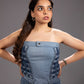 Ice Weave Denim Corset Top showing sculptural reconstructed denim panels