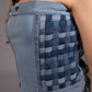 Close-up of Ice Weave Denim Corset Top showing woven denim construction