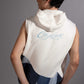 Back view of Layered Sleeveless Hoodie showing reconstructed denim patchwork