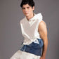 Layered Sleeveless Hoodie showing layered blue denim textures and geometric forms