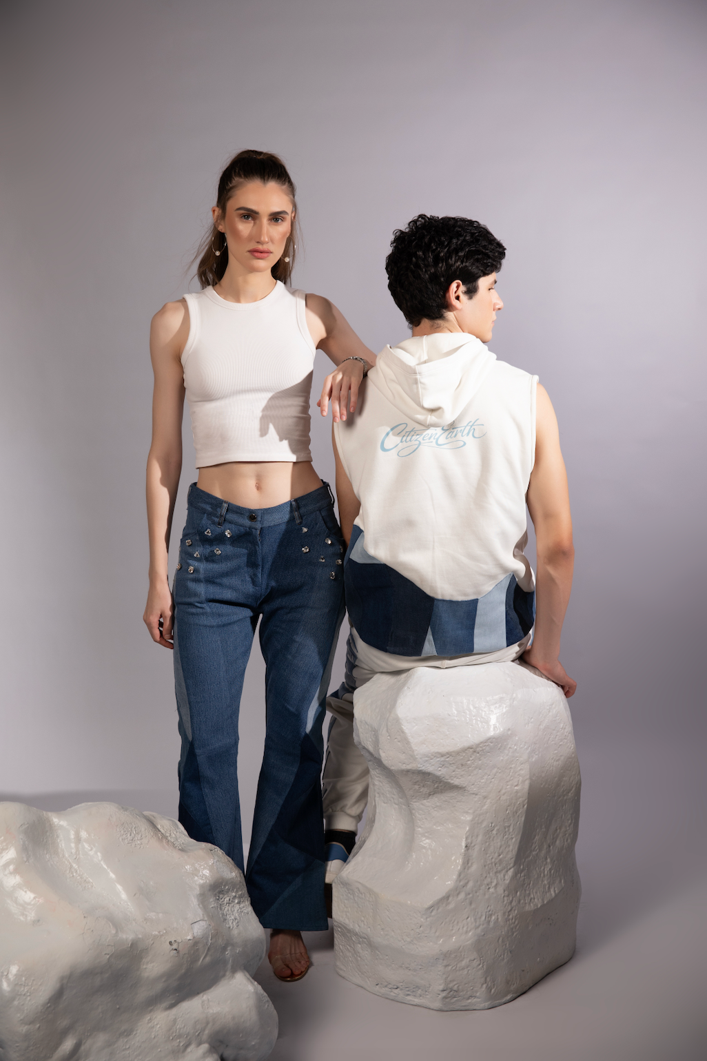 Layered Sleeveless Hoodie styled in reconstructed denim with polar-inspired patchwork