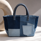 Close-up of Meridian Mini Tote Bag showing geometric repurposed denim panelling