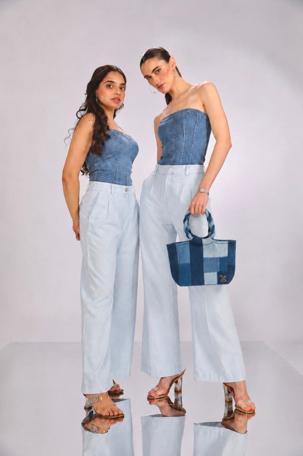 Pack Ice Handbag featuring braided rolled handles and polar-inspired denim panels