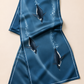 Close-up of Penguins Making Waves Scarf showing penguins and ocean waves