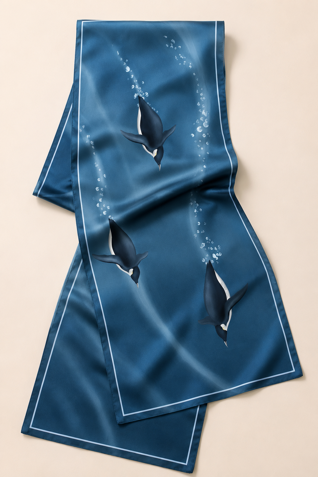 Close-up of Penguins Making Waves Scarf showing penguins and ocean waves