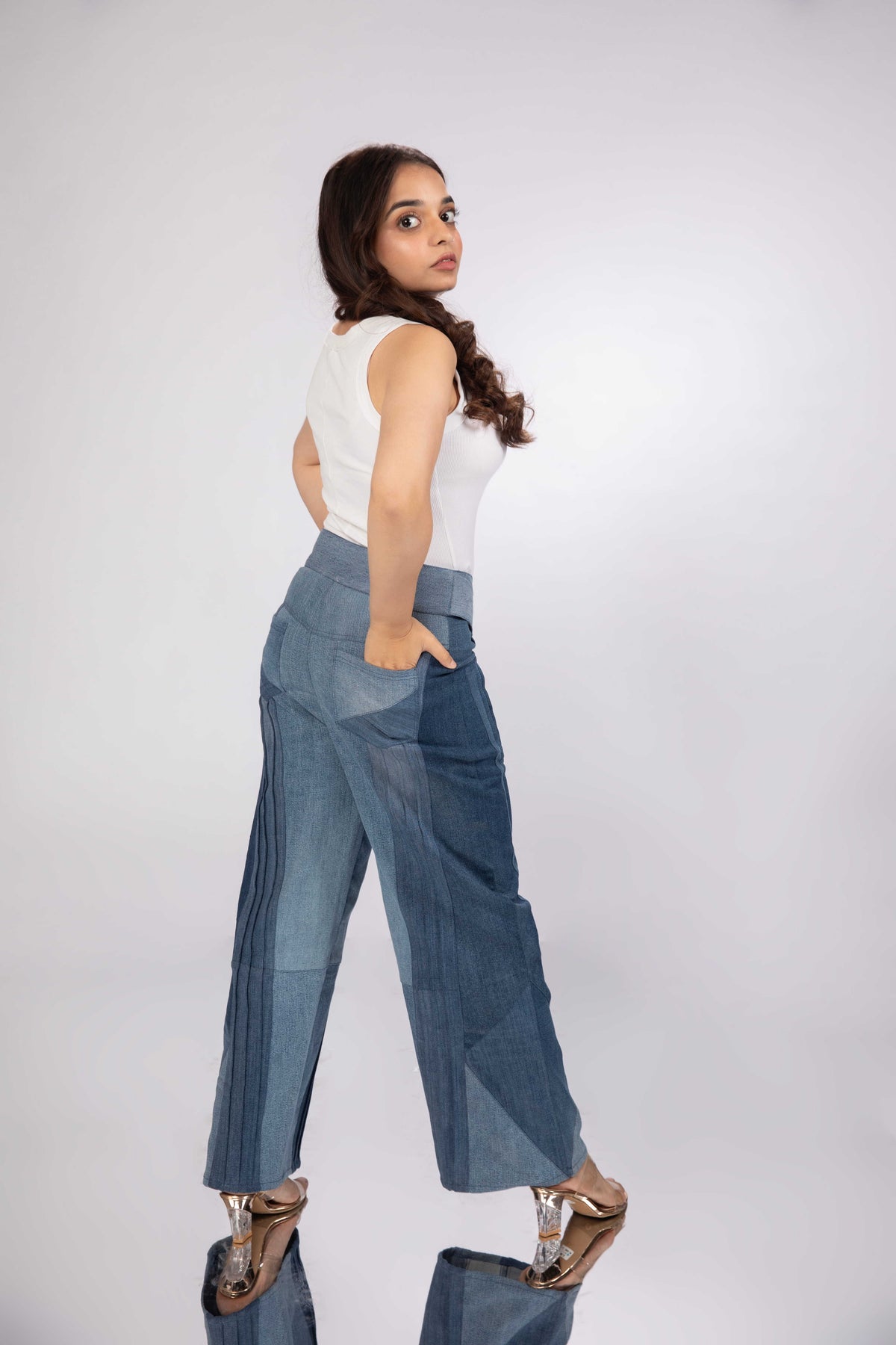 Back view of Pleated Terrain Jeans in repurposed denim