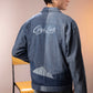 Back of Polar Divide Denim Jacket featuring glacier-inspired denim patchwork