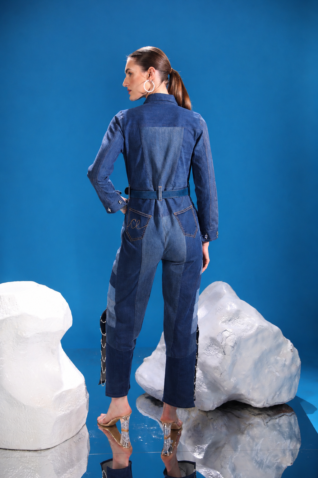 Back view of Polar Terrain Denim Jumpsuit in repurposed denim