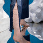 Close-up of Polar Terrain Denim Jumpsuit showing full sleeve, lapel collar, central zipper and bead detailing