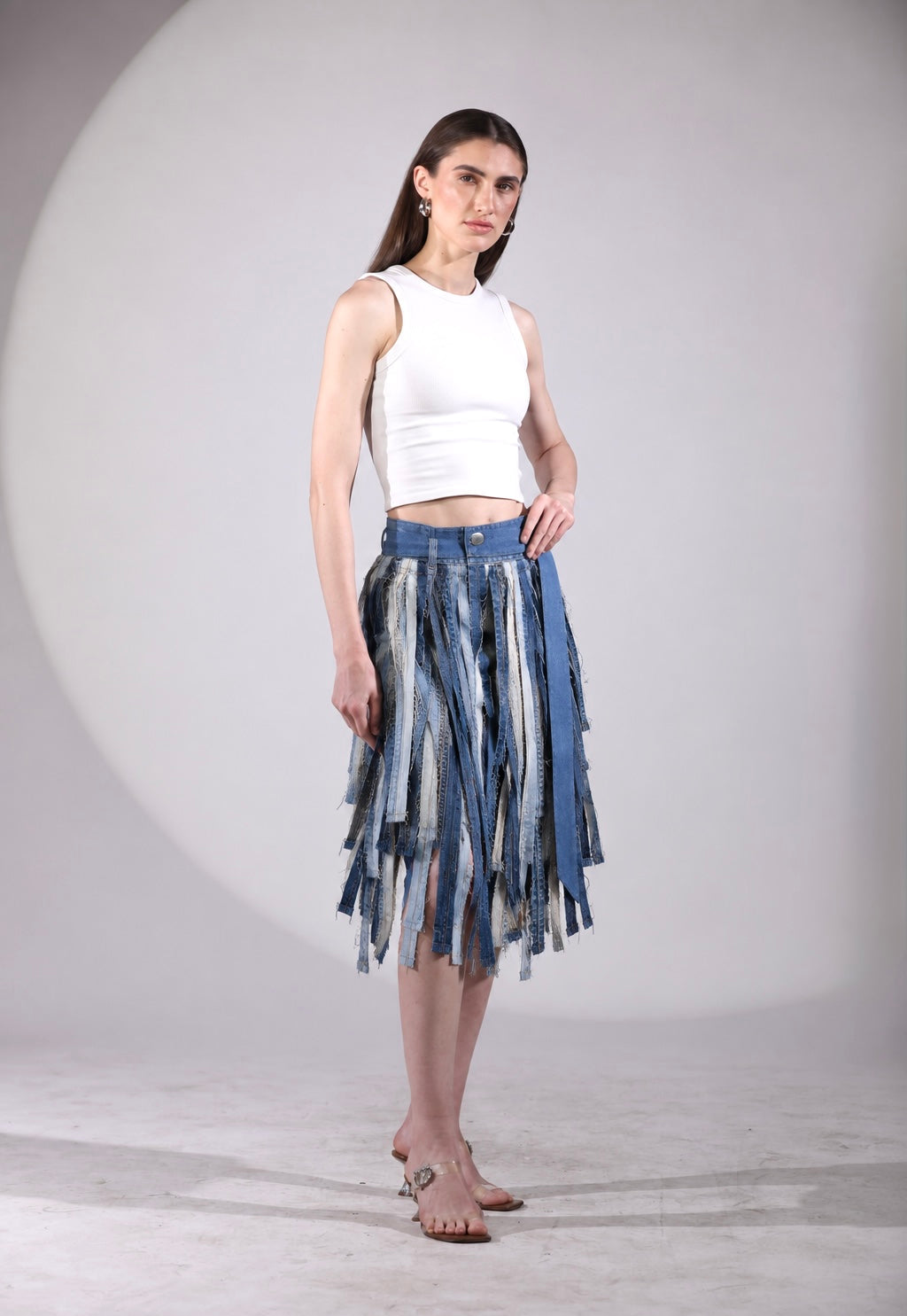 The Meltwater Skirt made from repurposed denim in layered blue tones