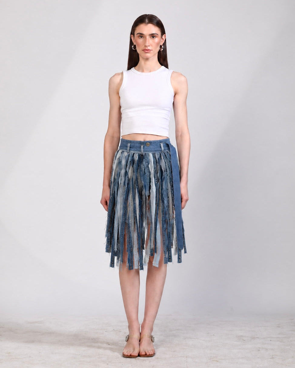 The Meltwater Skirt in repurposed denim with deconstructed stripwork.